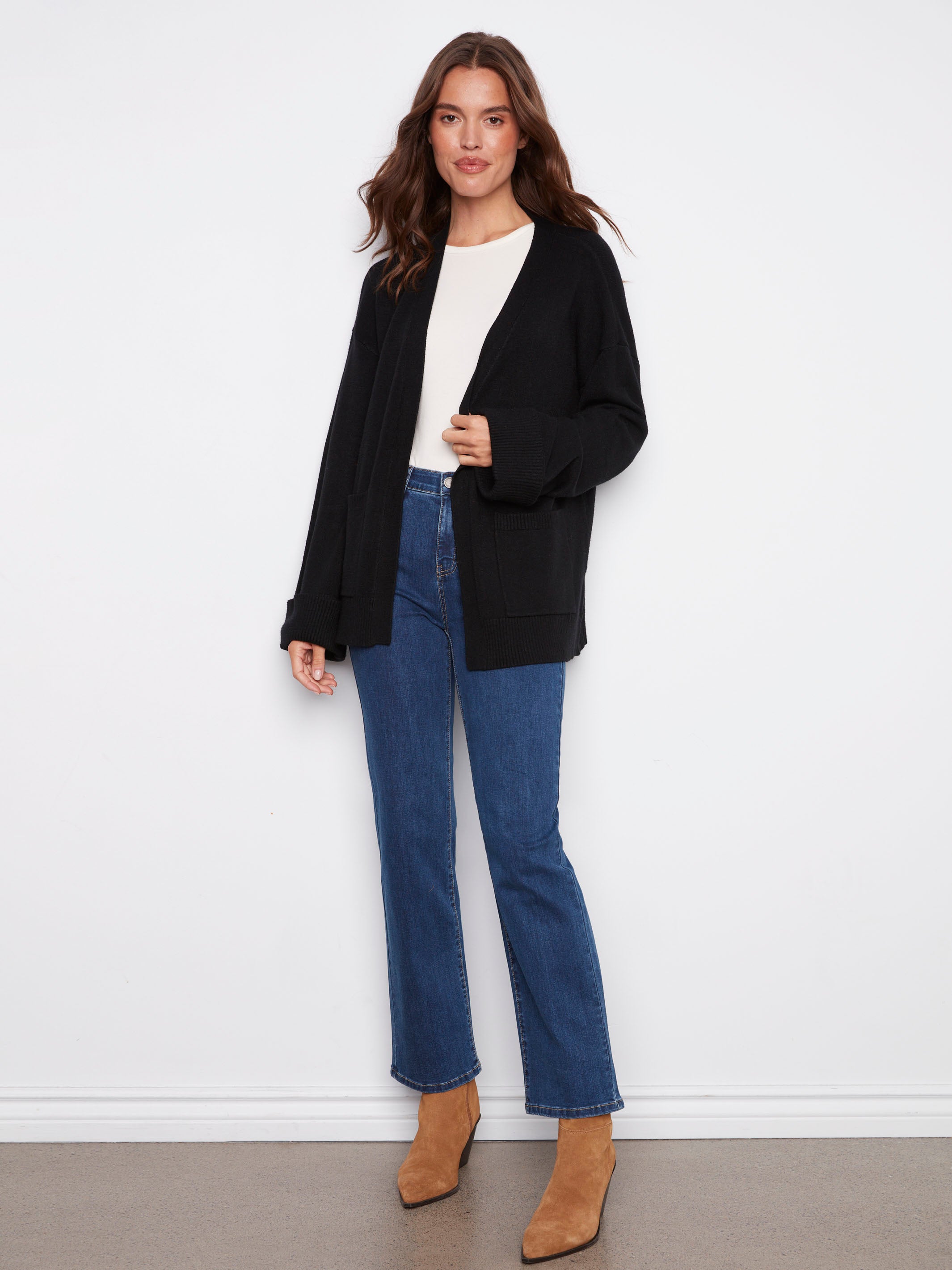 Elegant black cardigan with an open front design, offering versatility and ease of wear by Charlie B.