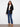 Elegant black cardigan with an open front design, offering versatility and ease of wear by Charlie B.
