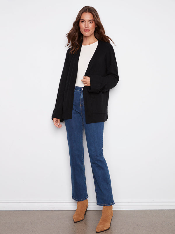 Elegant black cardigan with an open front design, offering versatility and ease of wear by Charlie B.