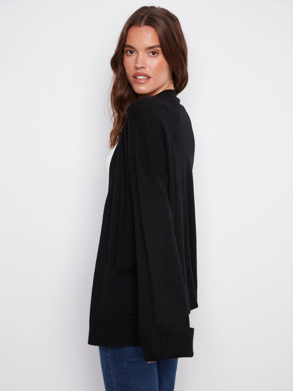 Chic black cardigan with a relaxed fit and wide cuffs, ideal for comfortable yet trendy everyday wear by Charlie B.