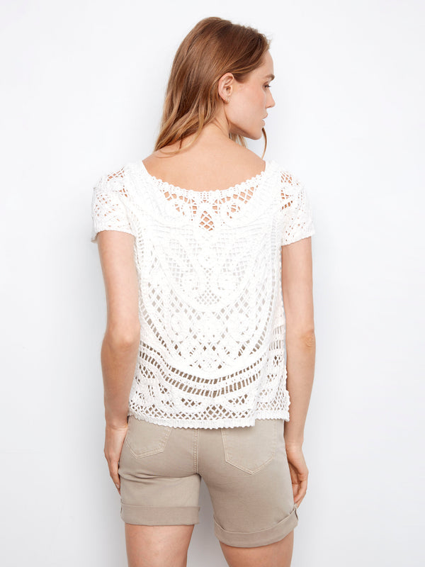 Stay chic with the button-down feature of this white crochet top, offering both style and functionality in breathable cotton by Charlie B.