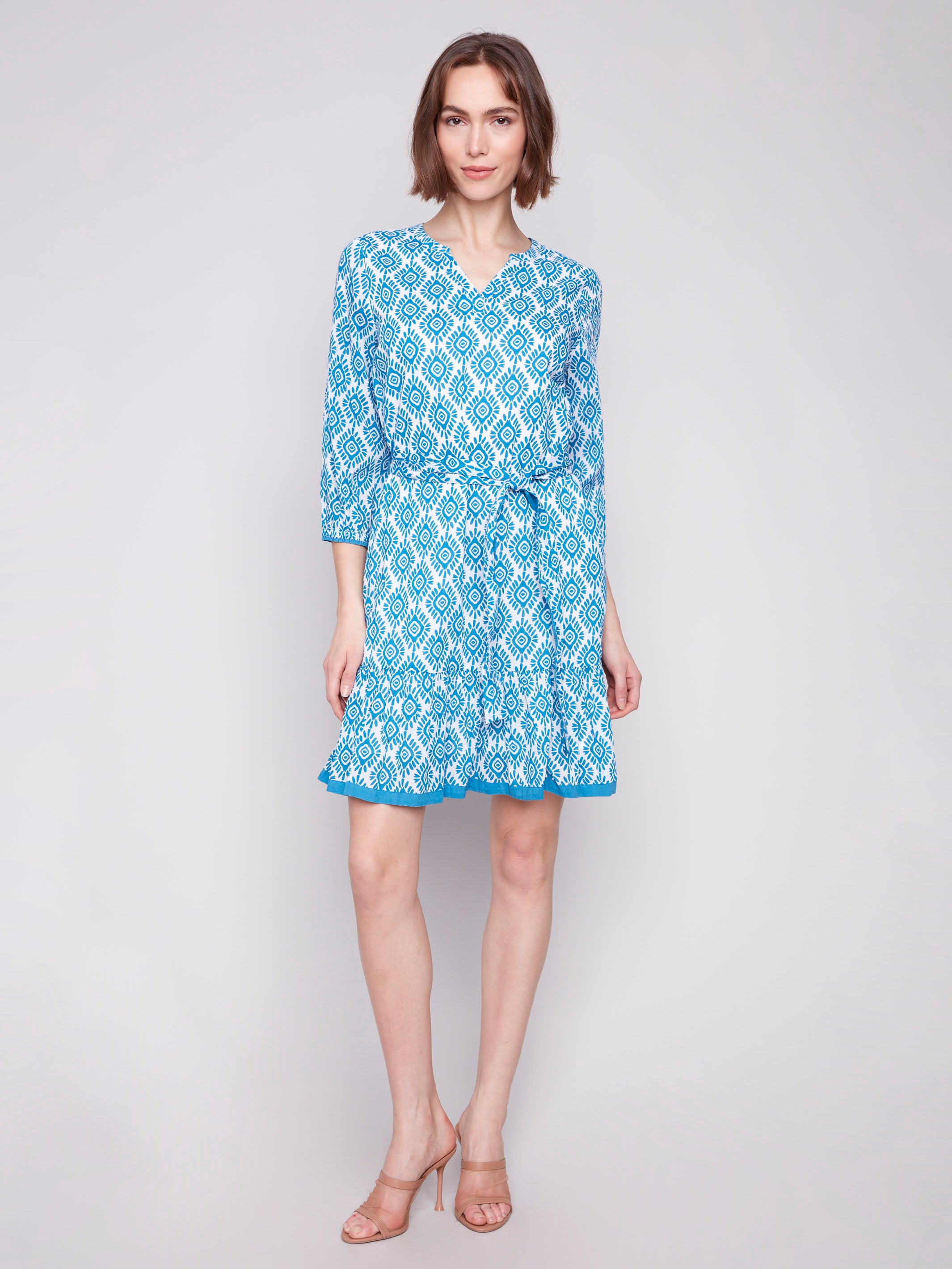 Dress with a geometric pattern and notched V-neckline by Charlie B.