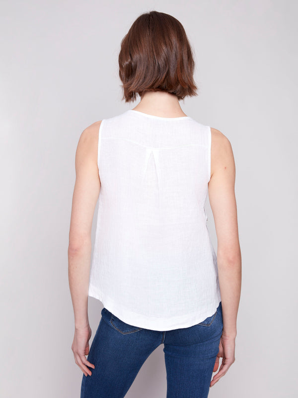 Chic white linen tank showcasing a high-low hem design by Charlie B.