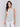Chic sleeveless design in natural linen fabric by Charlie B.