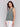 Sleeveless celadon tank top featuring unique side button detailing by Charlie B.