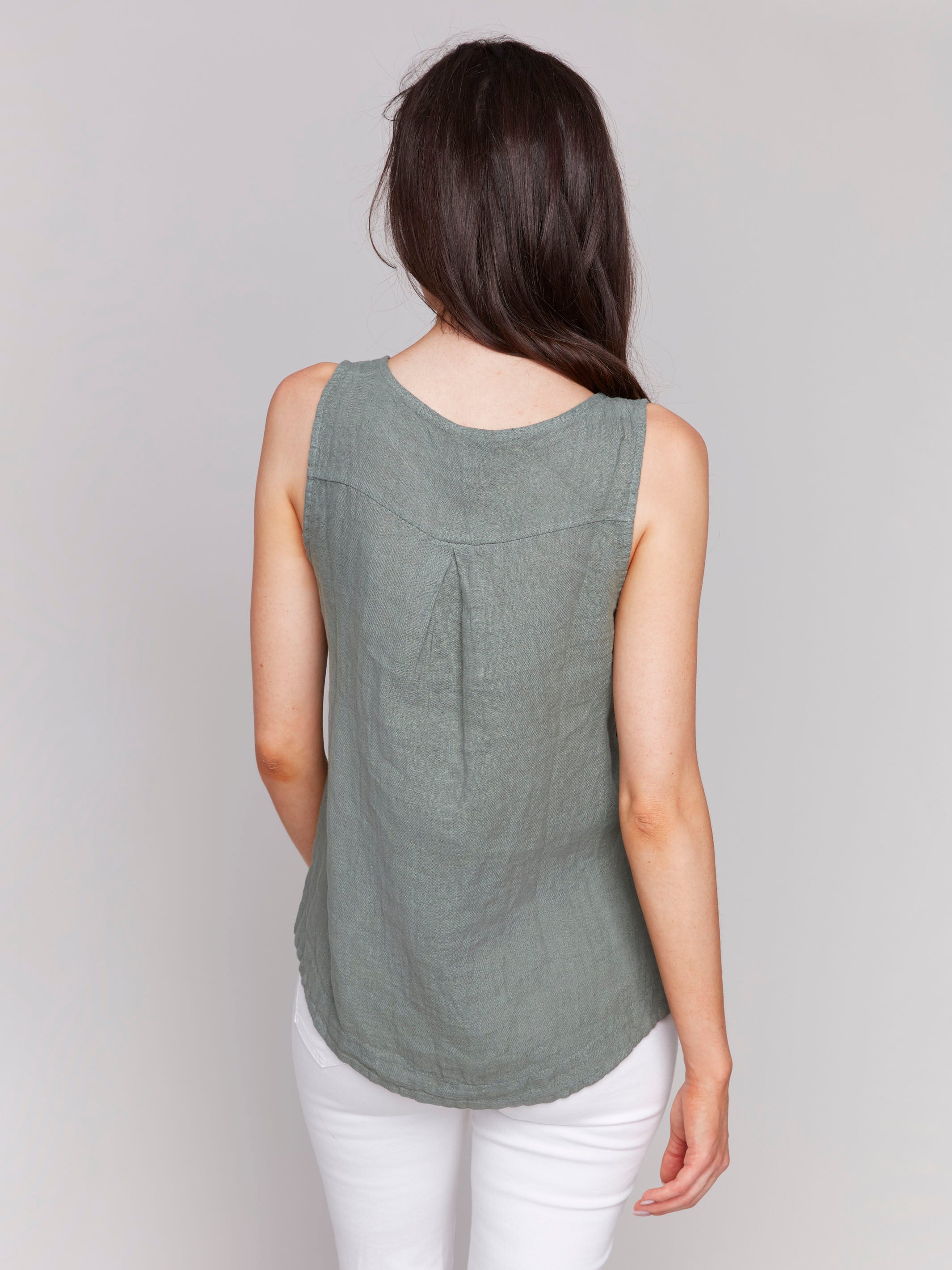 Elegant sleeveless design in celadon linen, perfect for any occasion by Charlie B.