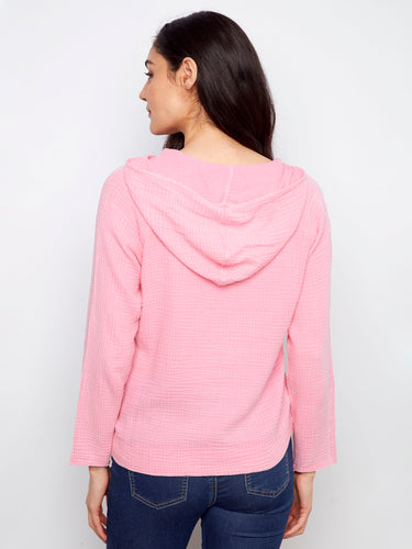 Elegant pink bubble cotton hoodie showcasing its versatile kangaroo pocket by Charlie B.
