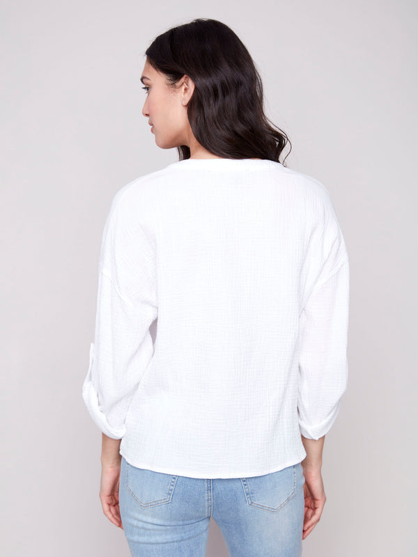 Stylish white cotton blouse with acid wash finish, ideal for fashion-forward individuals by Charlie B.