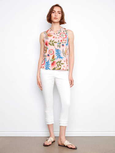 Bright floral top with ruffled details at the neckline, perfect for casual or dressy occasions by Charlie B.