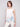 Linen blend top featuring a crew neckline and floral border print by Charlie B.