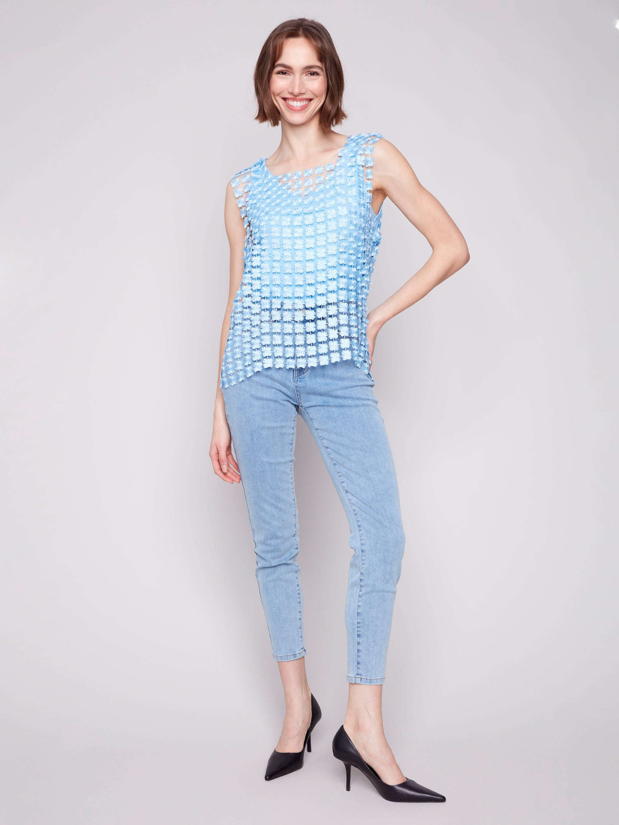 Textured floral sleeveless design in bluebell color by Charlie B.