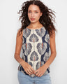 Linen blend blouse with abstract print in Tahiti hues, highlighted by a scoop neckline and sleeveless design by Charlie B.