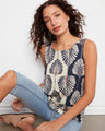 Abstract printed blouse in vibrant colors, featuring a sleeveless cut for warm days by Charlie B.