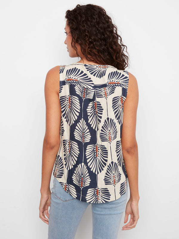 Elegant floral print top in calming blue tones, complete with a sleeveless design for versatility by Charlie B.