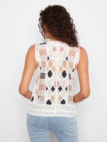 This garment's geometric patterns are beautifully integrated into the fabric's texture, adding depth and character to your ensemble. By Charlie B.