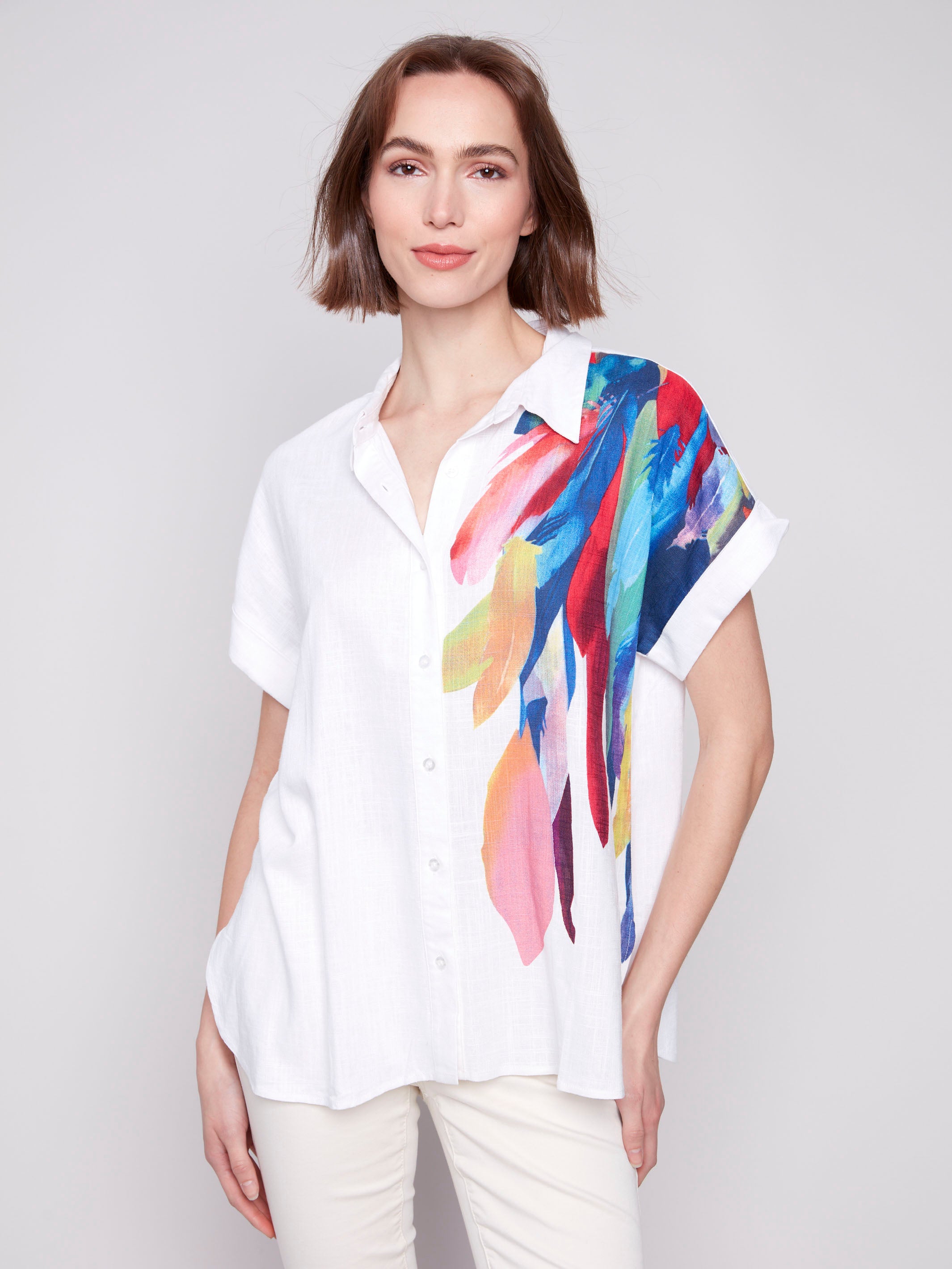 Shirt with a stylish collar and vibrant feather design by Charlie B.