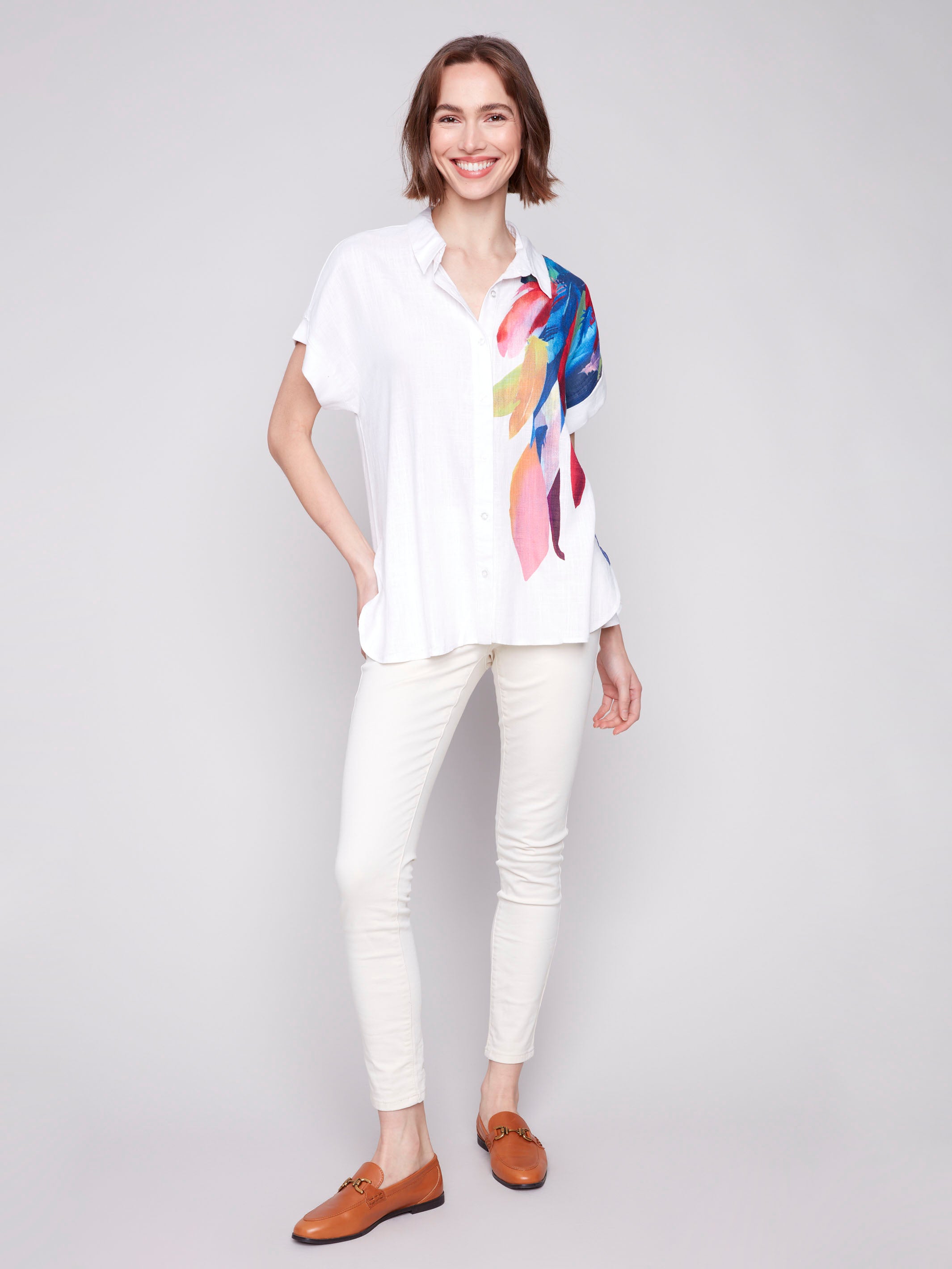 Button-up front shirt featuring a unique feather pattern by Charlie B.