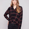 Fuchsia plaid blouse featuring a V-neck with Mao collar, adding a unique touch to the design by Charlie B.