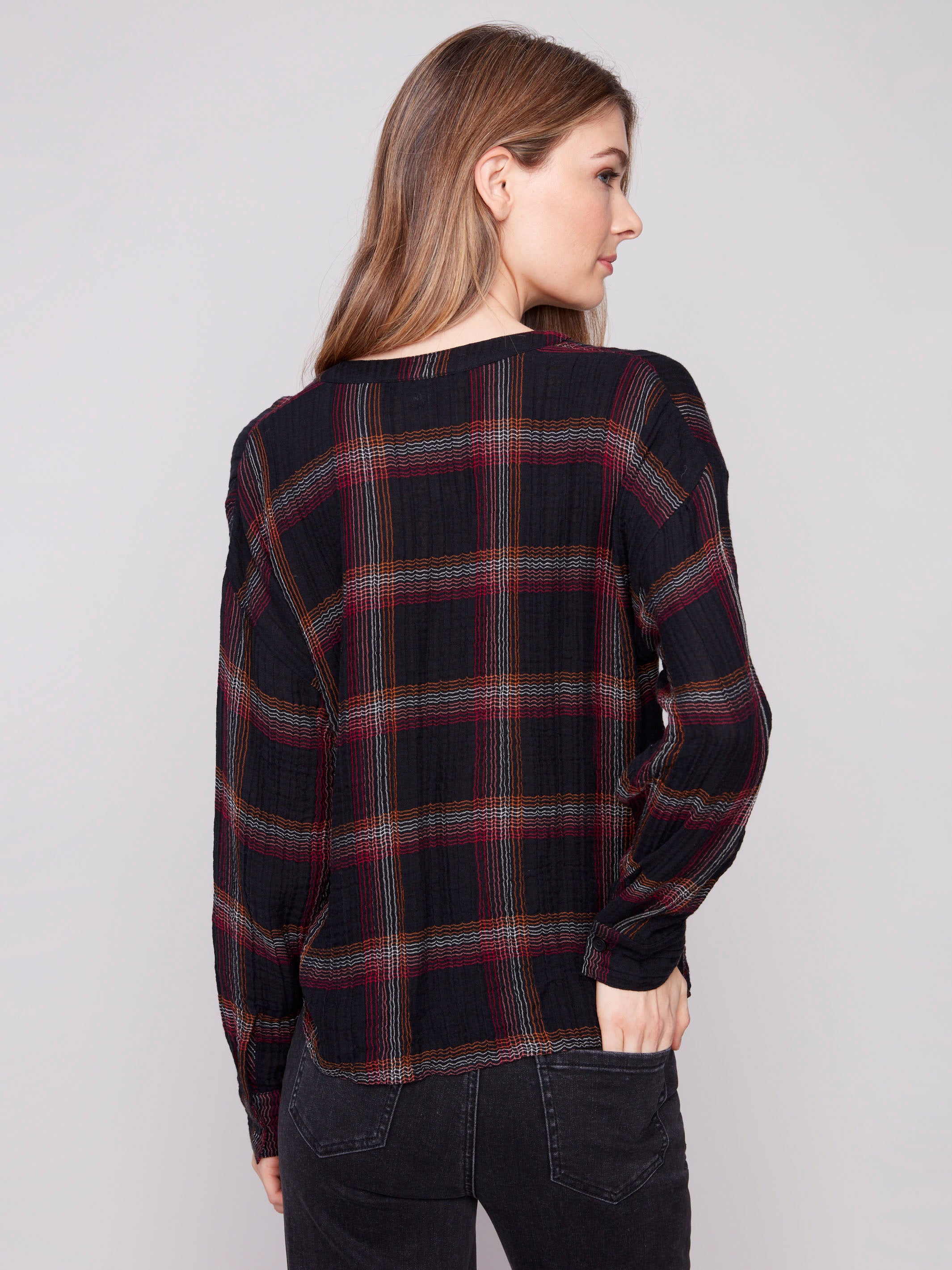 Blouse with drop shoulders in fuchsia plaid pattern, offering a relaxed and chic look by Charlie B.