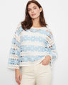 Crochet top in light blue and white with a delicate boat neckline, perfect for casual outings. Made from a cotton blend by Charlie B.
