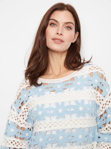 Crafted from a soft cotton blend, this crochet top is both breathable and stylish. Its airy design makes it ideal for any occasion by Charlie B.