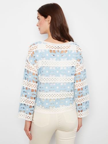 This versatile crochet top features drop shoulders that offer relaxed elegance. Perfect for pairing with jeans or skirts by Charlie B.