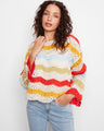 Colorful crochet top featuring drop shoulders and a scalloped hem, crafted from a cotton blend by Charlie B.