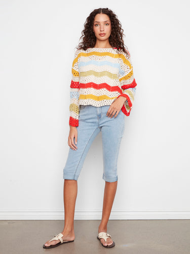 Crochet top with vibrant stripes and 3/4 bell sleeves, made from a soft cotton blend by Charlie B.