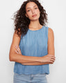 Medium blue top with a loose fit and scalloped hem, featuring decorative back buttons by Charlie B.