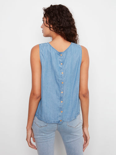 Light blue top showcasing a crew neckline and decorative back buttons by Charlie B.