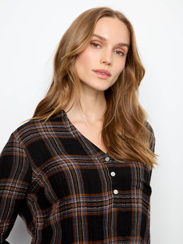 Featuring a relaxed fit and classic pattern, this plaid shirt is an essential addition to any wardrobe by Charlie B.