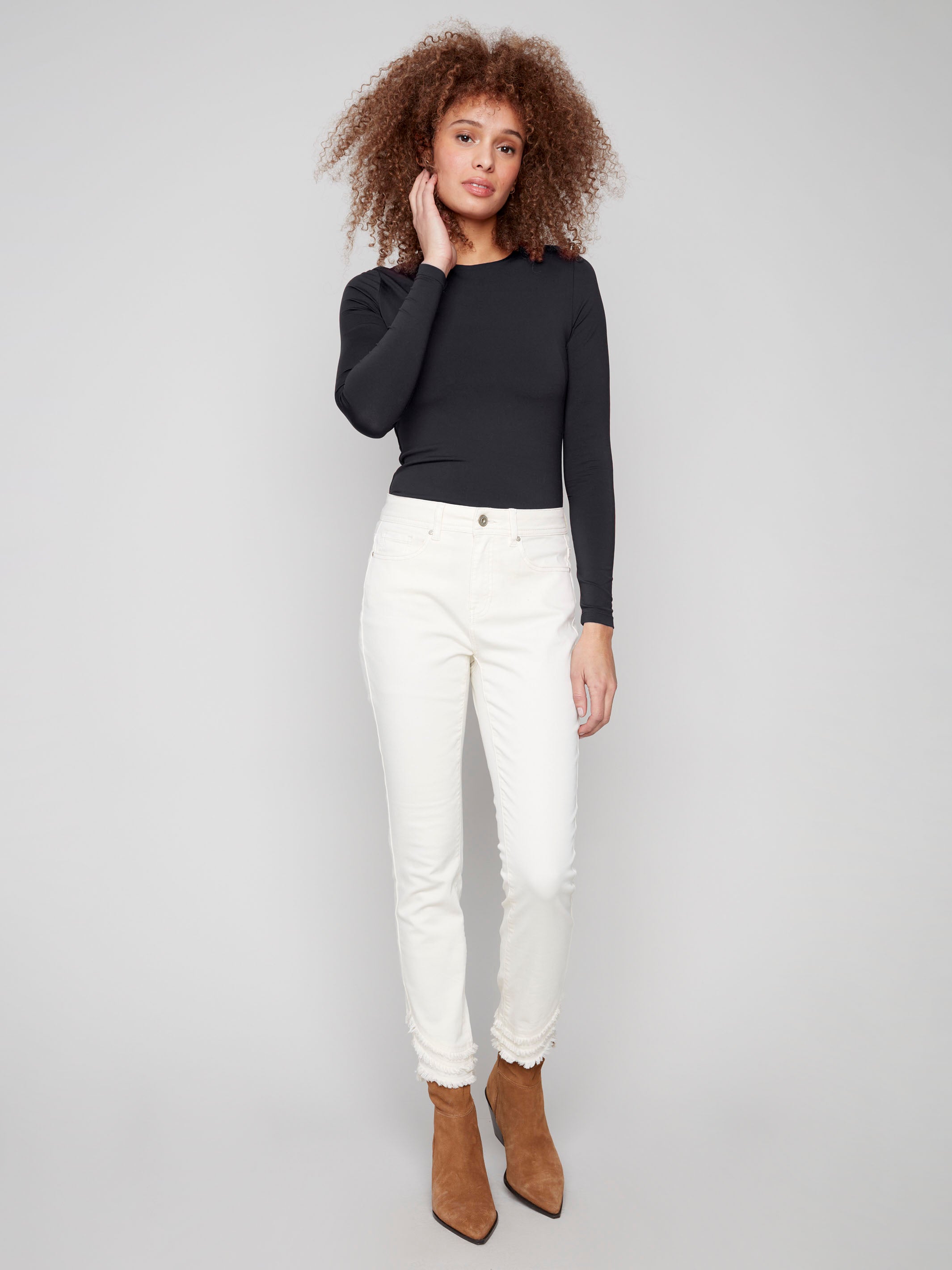 Natural-colored pants with a slim fit, crafted from stretch denim for comfort and style by Charlie B.