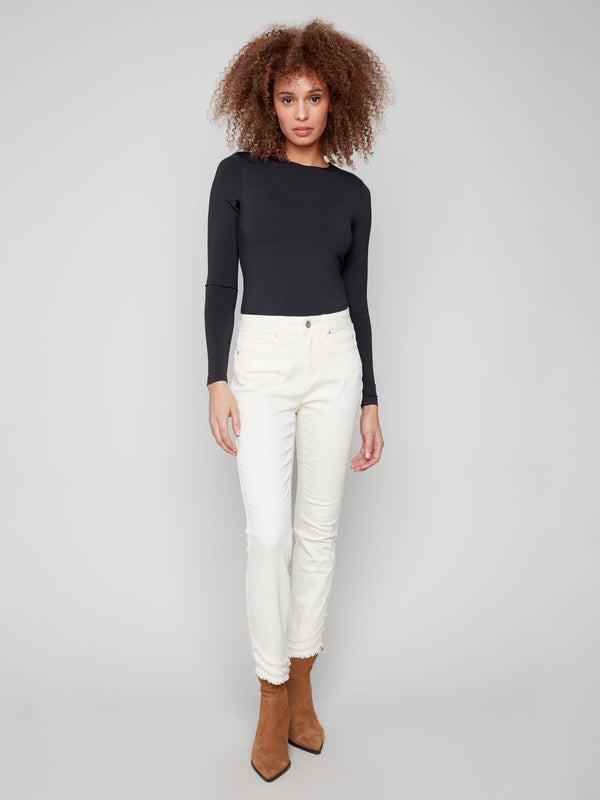 The regular rise waist enhances the classic appeal of these natural-colored skinny twill pants by Charlie B.