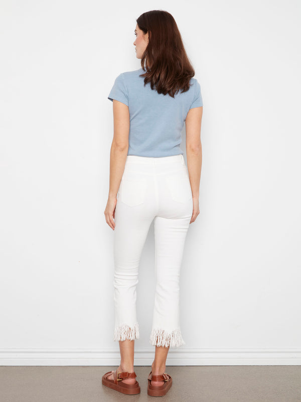 Featuring a regular rise waist, these white cropped jeans have fringed hems for added flair by Charlie B.