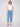 Blue cropped jeans with a fashionable fringed hem and bootcut leg design by Charlie B.