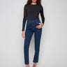 Dark blue jeans with a slim fit, showcasing a regular rise and stretch denim for comfort by Charlie B.