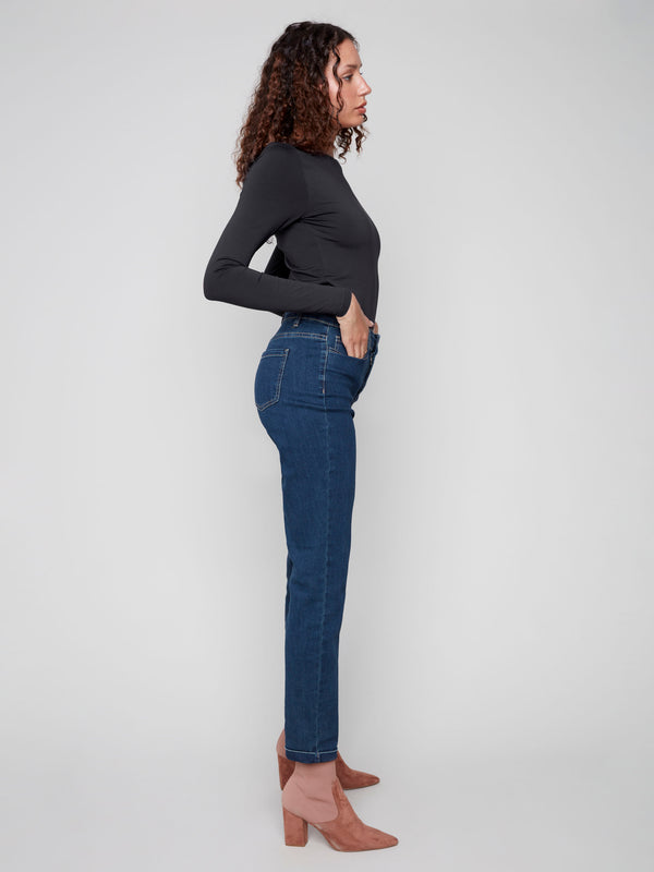 Designed with a classic five-pocket style, these jeans blend functionality with fashion by Charlie B.