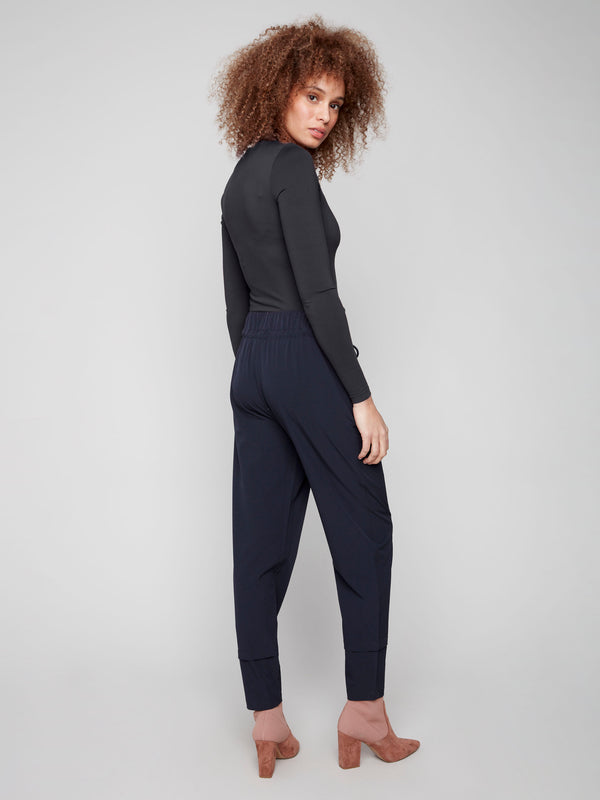 Enjoy the comfort of an elastic waistband in these stylish navy techno pants by Charlie B.
