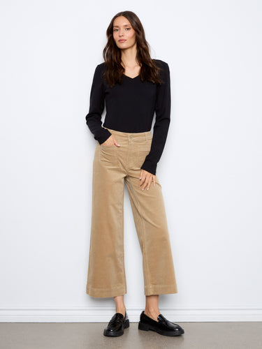 Crafted from stretch corduroy, these pants provide flexibility and style in one chic package. By Charlie B.