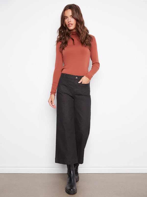 Stylish leopard print pants with a flare fit and stretch denim for comfort by Charlie B.