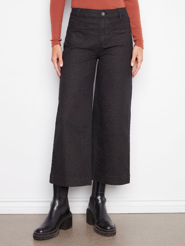 Trendy cropped leopard print pants featuring front patch pockets by Charlie B.