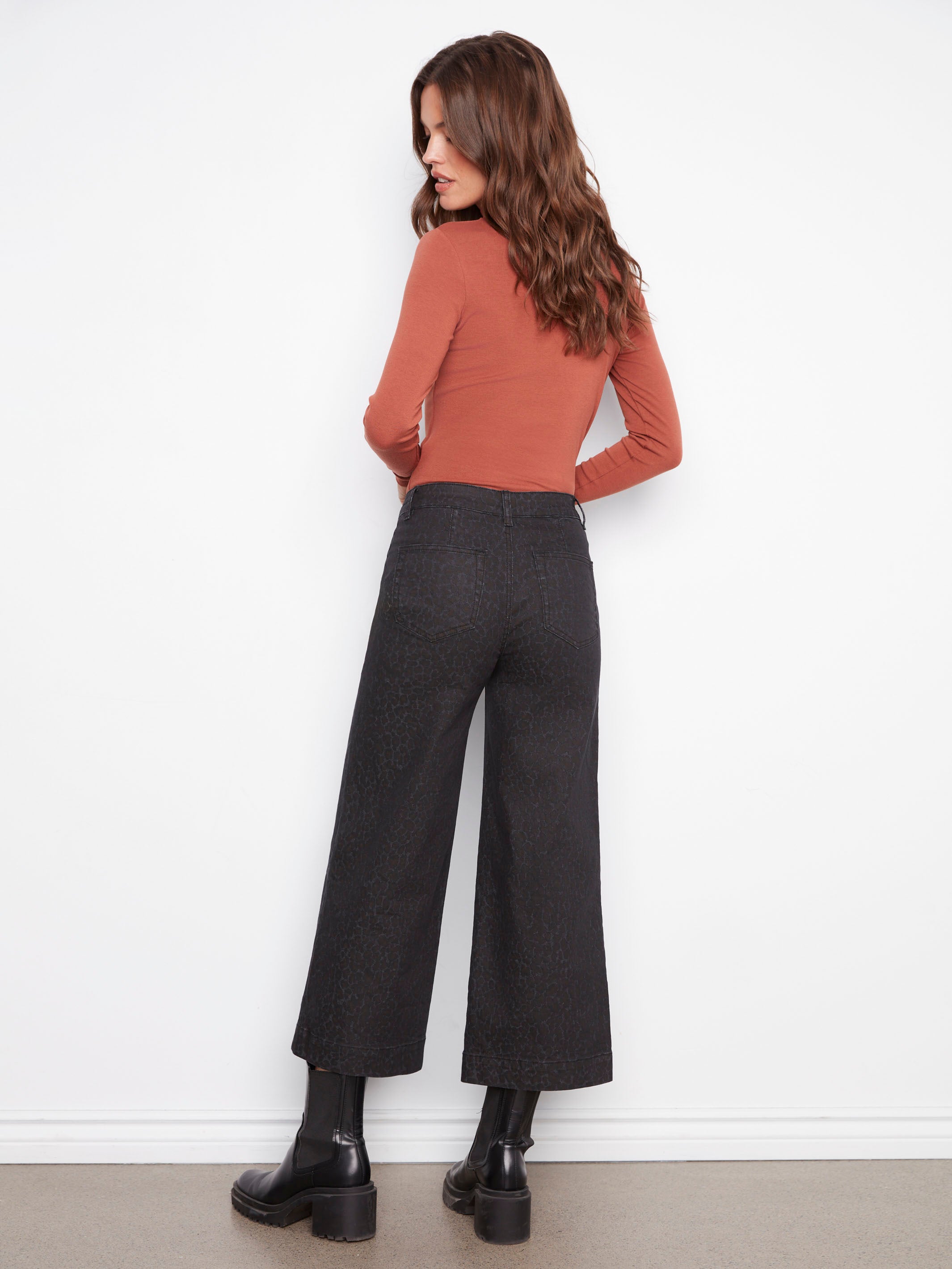 Fashionable flare pants in a cropped length with back pockets by Charlie B.