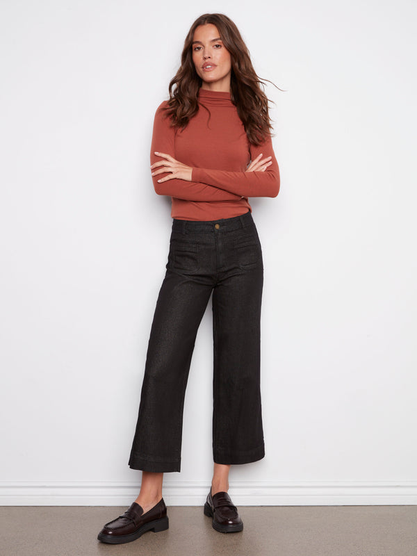 Black cropped flare jeans featuring a comfortable stretch denim, perfect for easy movement by Charlie B.