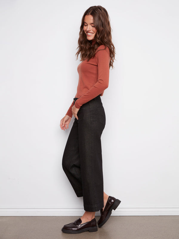 These chic jeans have front patch pockets and back pockets for practical style by Charlie B.