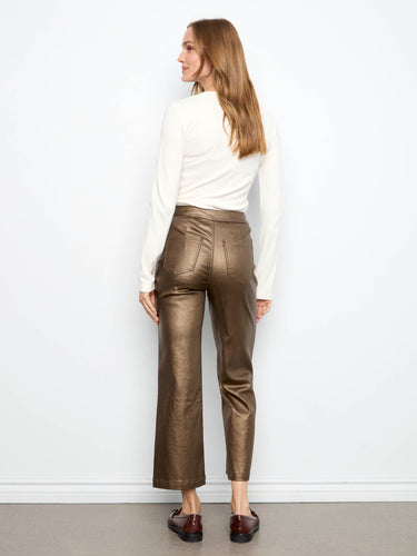 Stylish metallic copper pants with a regular rise, highlighted by fashionable front welt pockets by Charlie B.