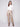 Brass metallic wax pants featuring a stylish flare fit, perfect for elevating your wardrobe essentials by Charlie B.