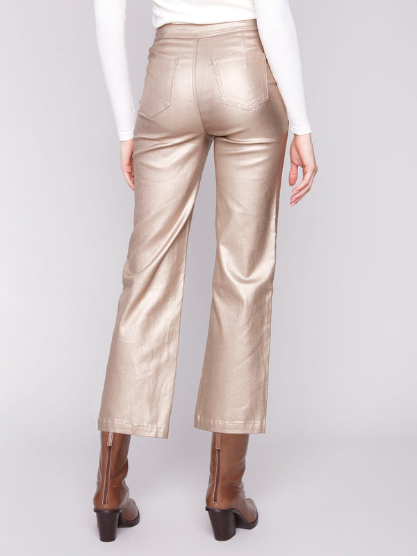 Sophisticated brass metallic wax pants designed with a trendy cropped length for a contemporary vibe by Charlie B.