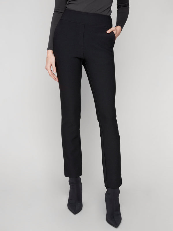 Sleek black dress pants with an elastic waistband, designed for a comfortable fit and modern look by Charlie B.