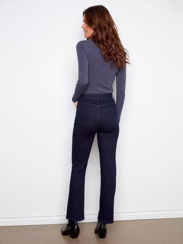 Designed with a regular rise, these classic blue-black jeans provide a flattering silhouette by Charlie B.