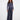 Blue-black jeans featuring a long length and button front closure, perfect for versatile styling by Charlie B.